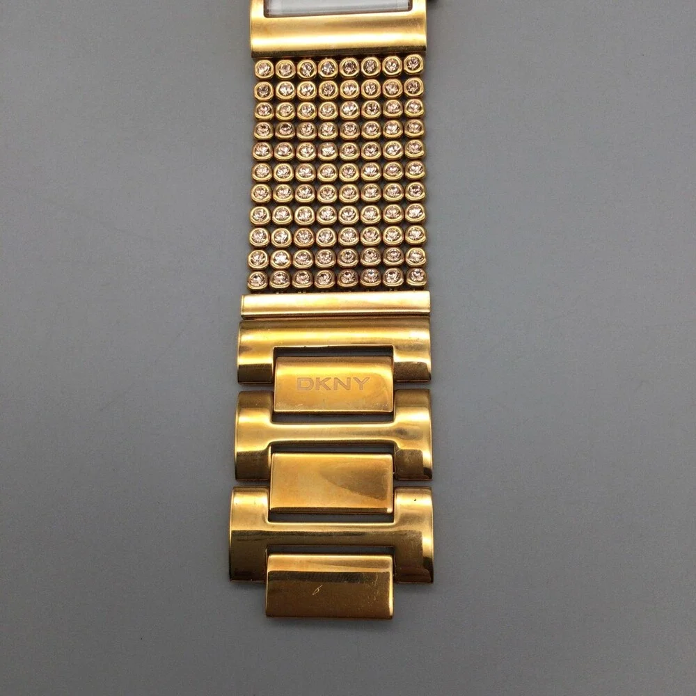 DKNY NY4905 Womens Dress Watch 32mm White Dial Gold Tone Crystals New Battery 7